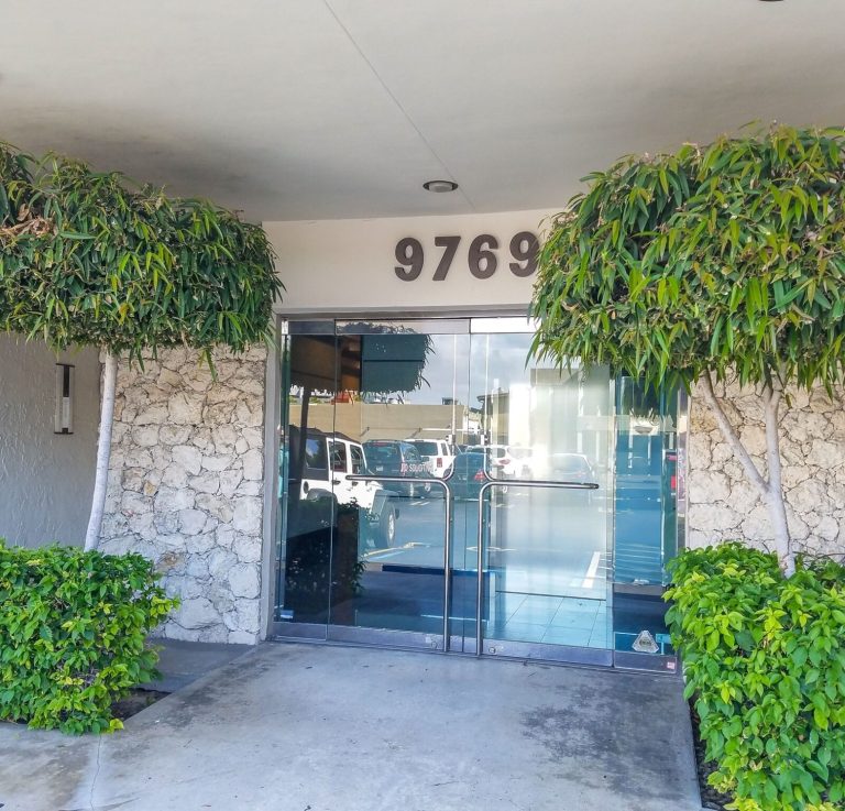 Entrance of a building at 9760 South Dixie Highway, Miami, Fl 33156
